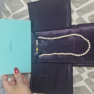 Tiffany & Co. genuine pearl necklace 18" with 14k gold clasp strung on silk